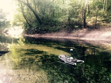 Picture of the flowmeter on its floating platform in the Suwannee River.