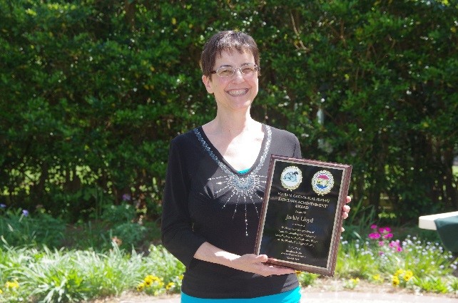 Jackie Lloyd accepts the Herman Gunter Lifetime Achievement Award at the FGS Awards Luncheon